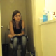 A hidden camera set up in a bathroom records a pretty girl taking a shit that comes out with a squeaking sound shortly after she sits down on the toilet. She also takes a long piss and appears very sleepy. About 5.5 minutes.